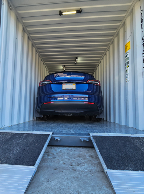 Storage Container with Ramps, Lights and Tesla